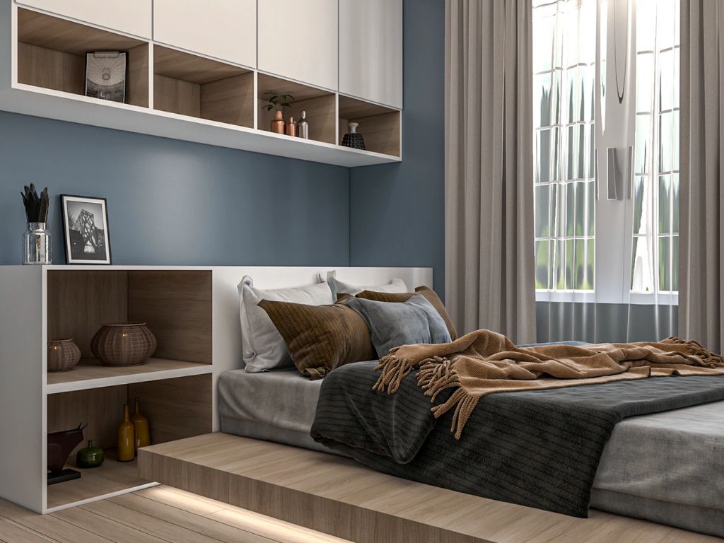 Phòng ngủ màu xanh, giường bố trí kế bàn trang điểm.