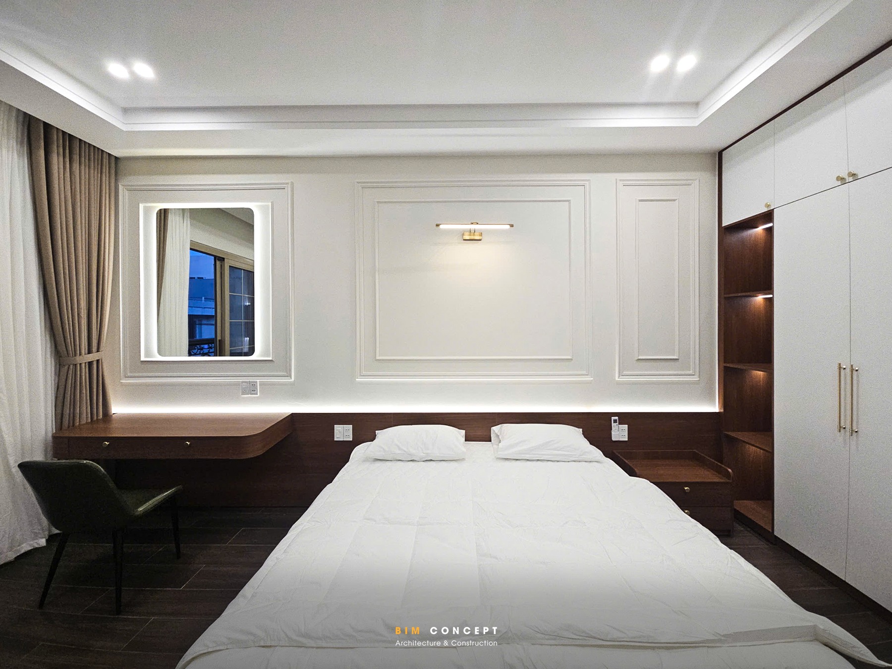 Thi công nội thất shophouse phòng ngủ thanh lịch với bàn tgrnag điểm và tủ quần áo.