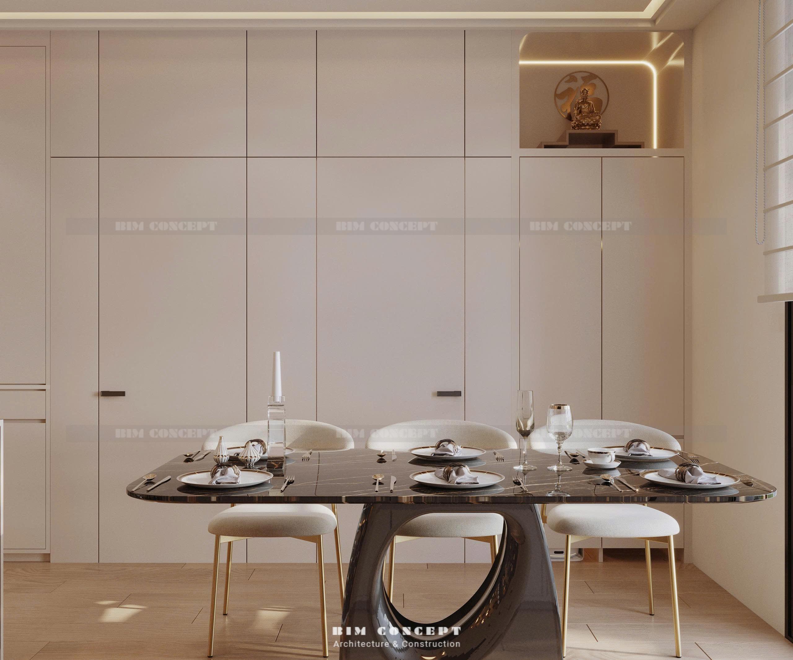 Bàn ăn mặt đá đen nổi bật giữa thiết kế nội thất căn hộ be