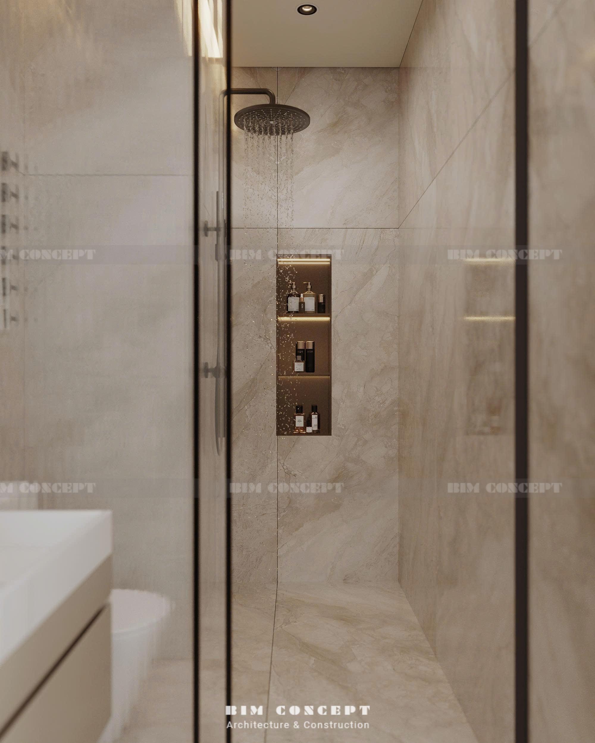 Phòng tắm đứng vách kính sang trọng với vòi sen trần, có hốc tường lát đá marble tích hợp