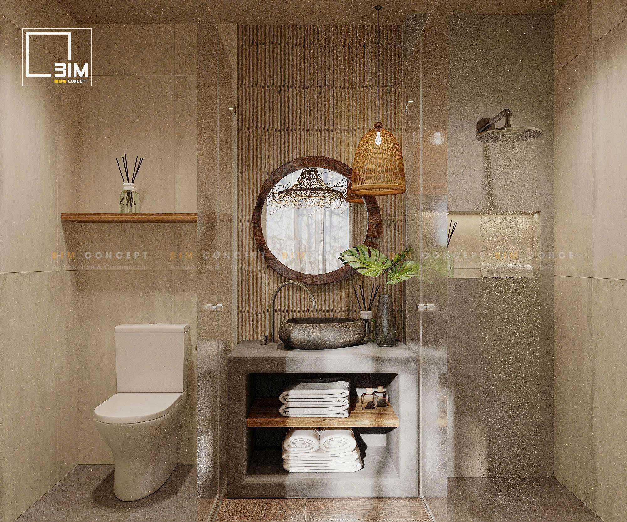 Phòng tắm lavabo đá thô gương tròn và ánh sáng vàng ấm áp