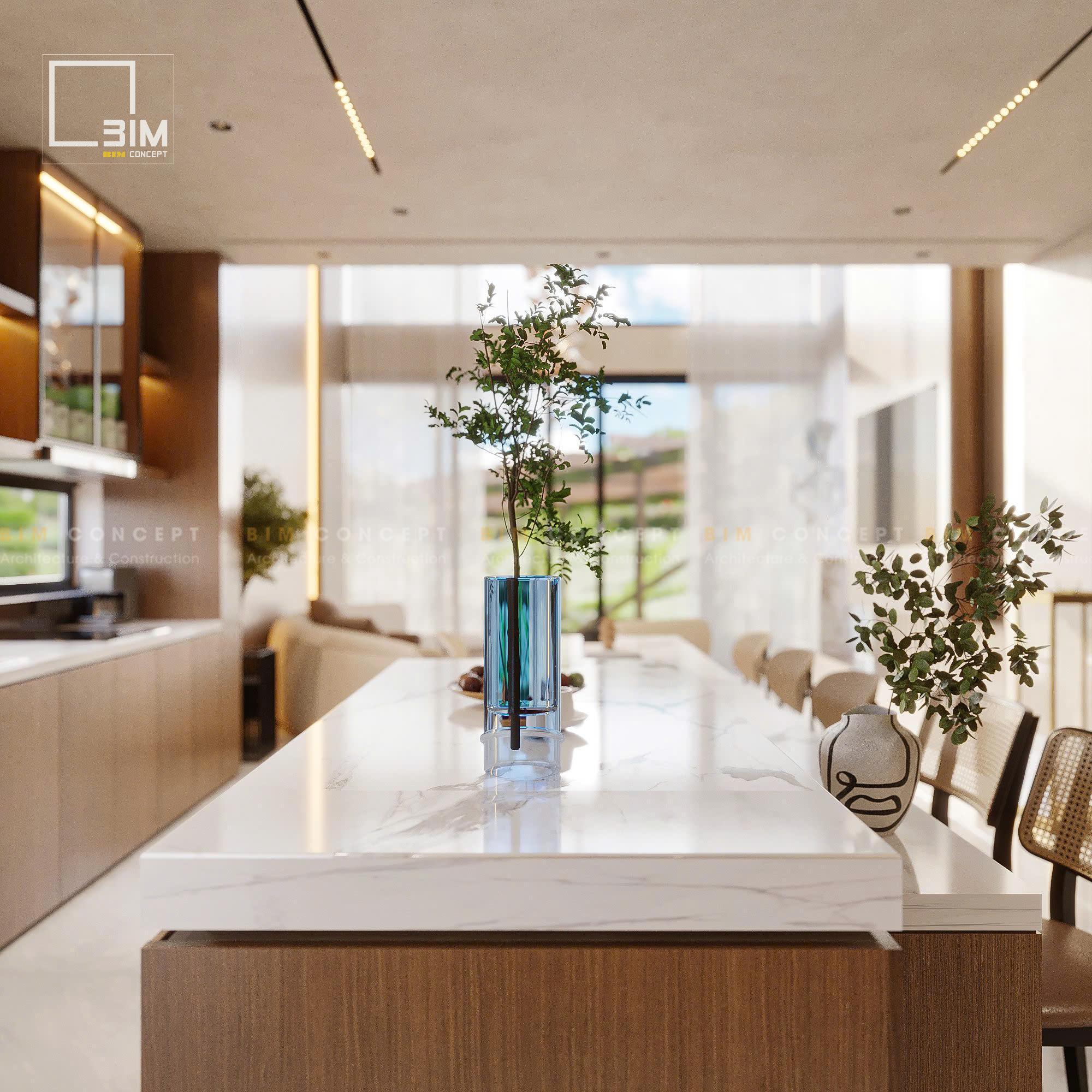 Bàn đảo bếp mặt đá trắng rộng rãi, sang trọng