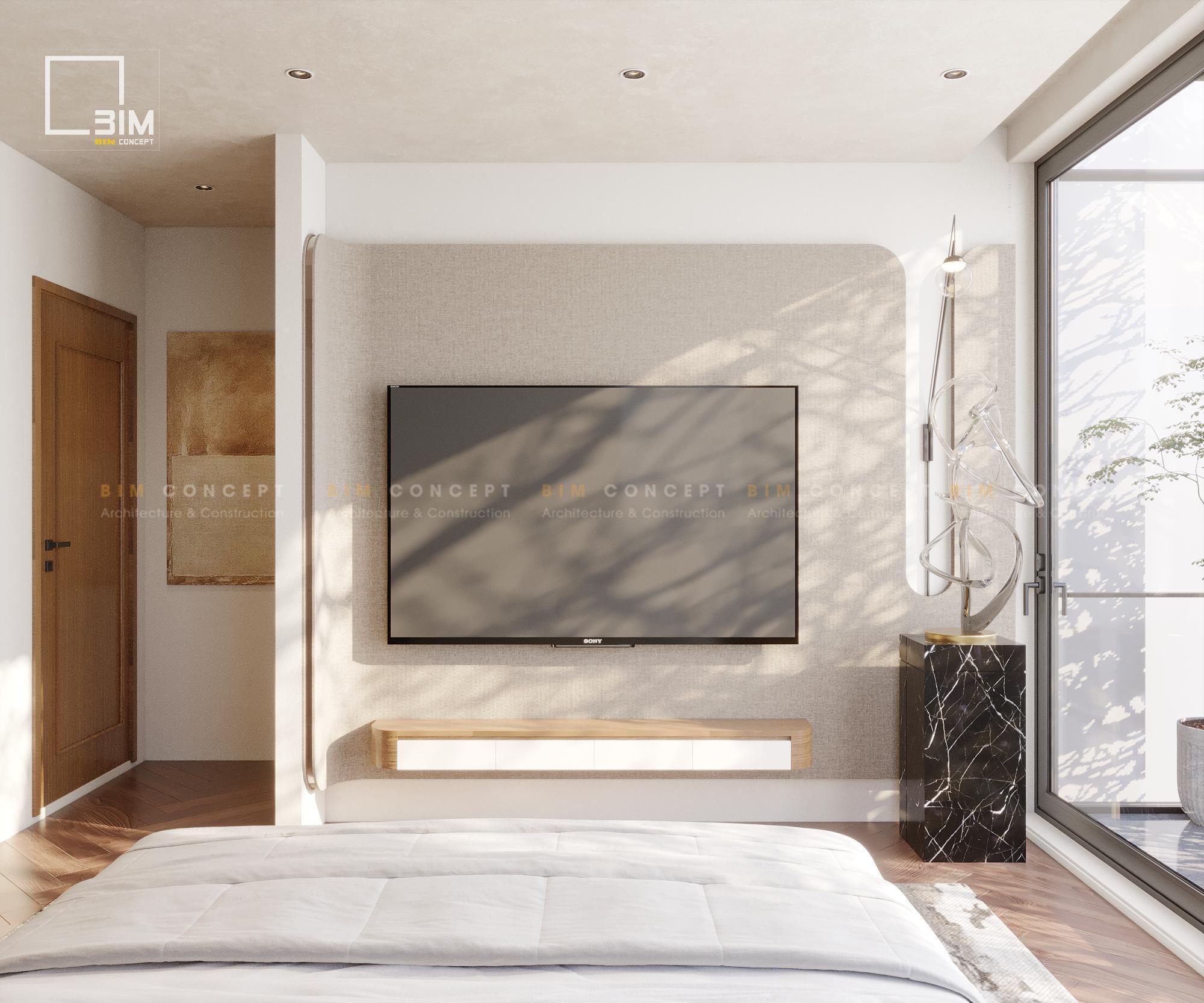 Khu vực TV treo tường đơn giản, đặt cạnh tác phẩm nghệ thuật