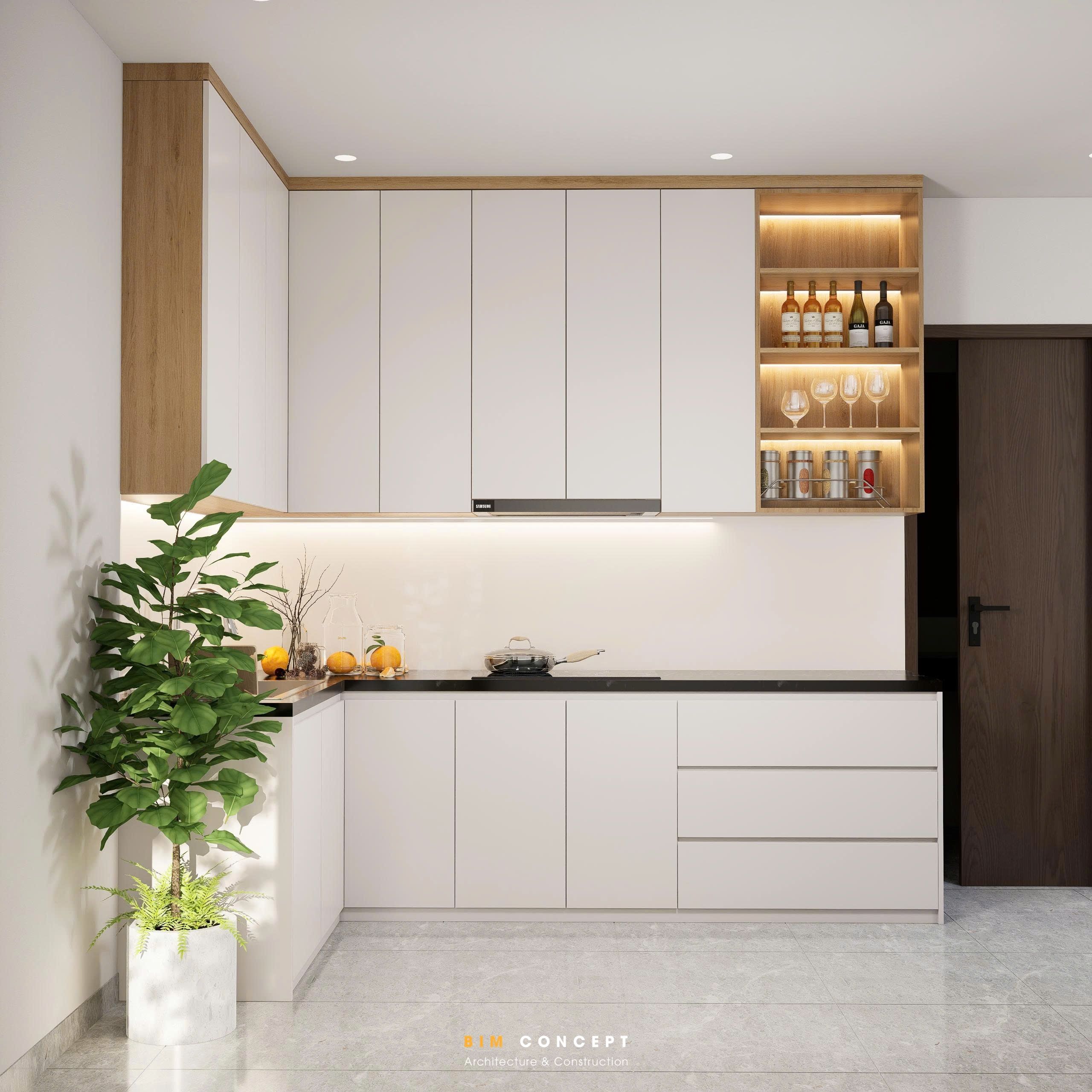 Bộ bàn ăn gỗ bo cong mềm mại cùng đèn thả trang trí ánh sáng ấm giúp không gian trở nên nhẹ nhàng và có chiều sâu hơn